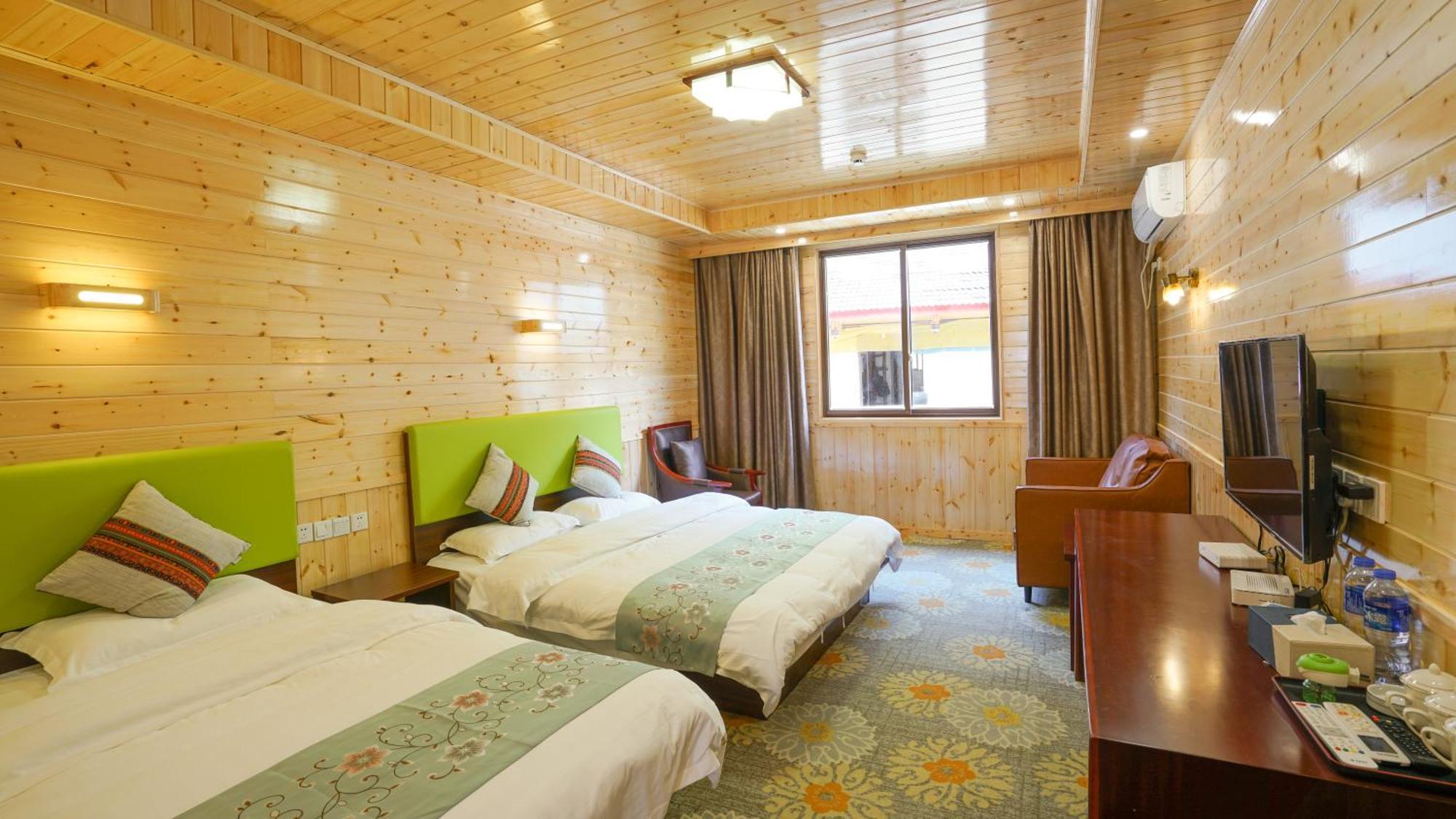 Jiuzhaigou Leisure Inn Room photo